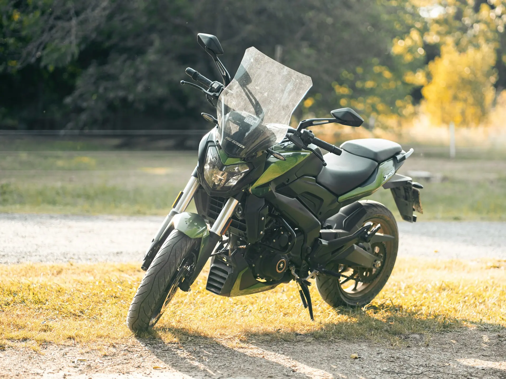 a motorcycle parked on the side of a road